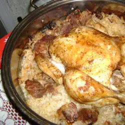 Ориз на фурна с цяло пиле и свинско